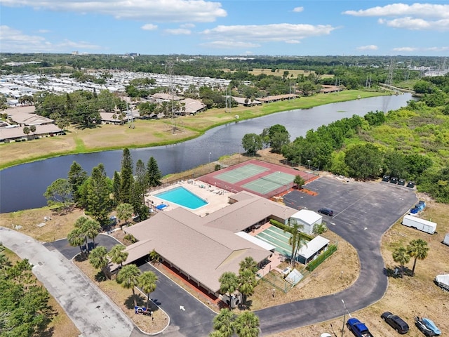 1515 12th Ct SE Unit 55, Largo, FL 33771 - bird's eye view of a large body of water, a tree filled landscape, and a pool