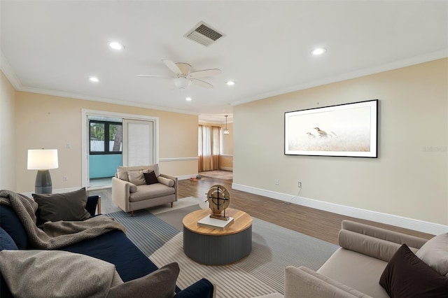 1515 12th Ct SE Unit 55, Largo, FL 33771 - living room with ornamental molding, recessed lighting, a ceiling fan, and wood finished floors