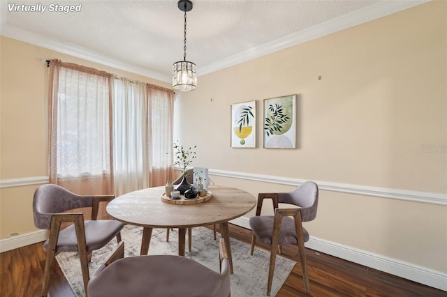 1515 12th Ct SE Unit 55, Largo, FL 33771 - dining area featuring wood finished floors, ornamental molding, a chandelier, and a textured ceiling