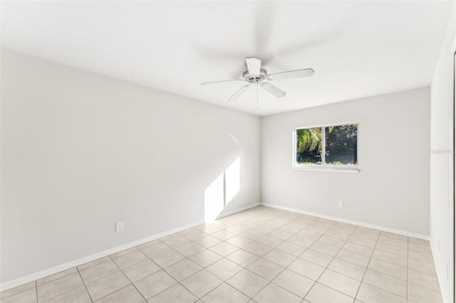 926 SW 37th St, Cape Coral, FL 33914 - spare room with a ceiling fan, baseboards, and light tile patterned floors