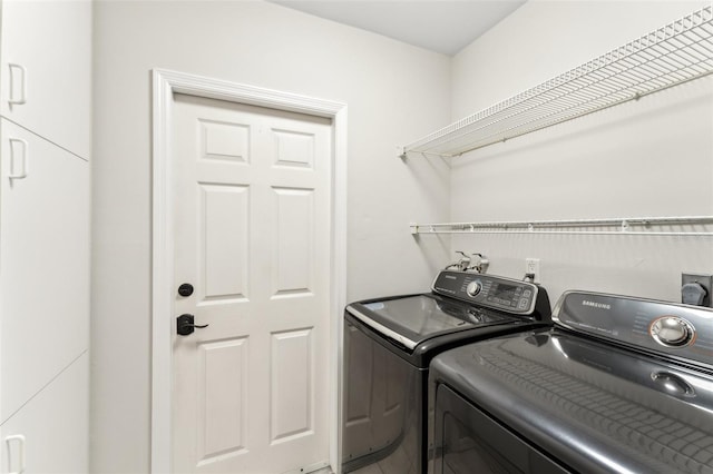 926 SW 37th St, Cape Coral, FL 33914 - washroom featuring washer and dryer and laundry area
