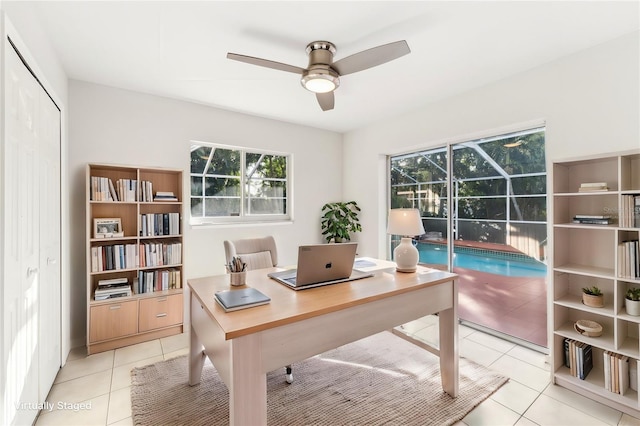 926 SW 37th St, Cape Coral, FL 33914 - office area featuring a ceiling fan, a wealth of natural light, and light tile patterned floors