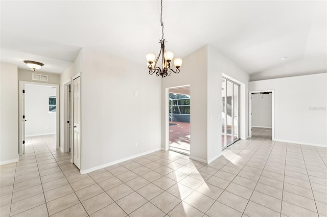926 SW 37th St, Cape Coral, FL 33914 - spare room featuring a notable chandelier, visible vents, light tile patterned floors, and vaulted ceiling