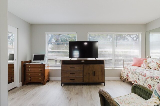 2457 Ecuadorian Way Unit 63, Clearwater, FL 33763 - interior space with baseboards and light wood-type flooring