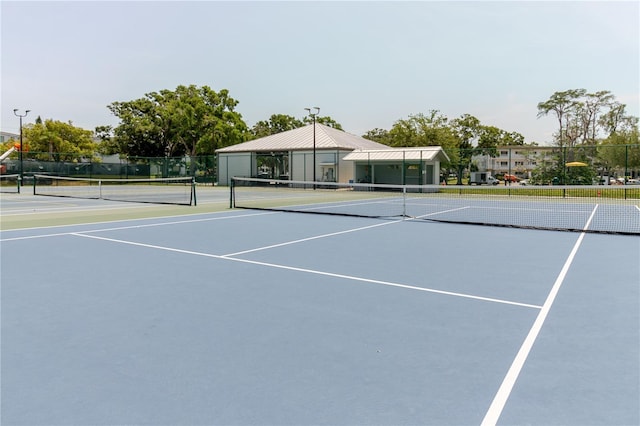 2457 Ecuadorian Way Unit 63, Clearwater, FL 33763 - view of tennis court with fence and community basketball court