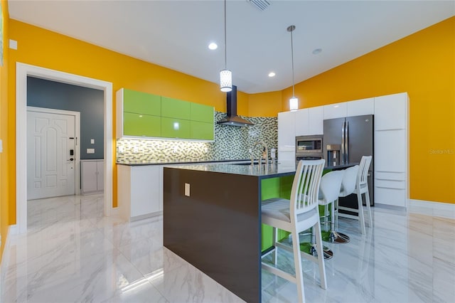 kitchen featuring wall chimney range hood, a sink, marble finish floor, and backsplash