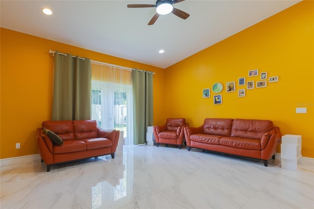 living area with recessed lighting, ceiling fan, marble finish floor, baseboards, and lofted ceiling
