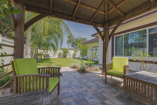 view of patio / terrace featuring a gazebo and a fenced backyard