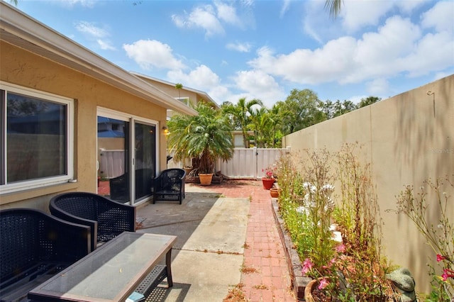 1671 Cape Ann Ave NE Unit 4, Saint Petersburg, FL 33702 - view of patio / terrace featuring a fenced backyard
