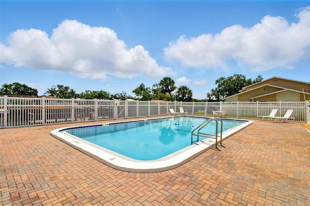 1671 Cape Ann Ave NE Unit 4, Saint Petersburg, FL 33702 - pool with a patio and fence