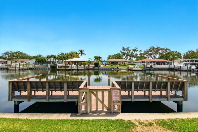 1671 Cape Ann Ave NE Unit 4, Saint Petersburg, FL 33702 - dock area featuring a residential view and a water view