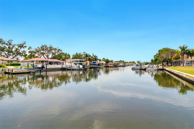 1671 Cape Ann Ave NE Unit 4, Saint Petersburg, FL 33702 - property view of water featuring a boat dock