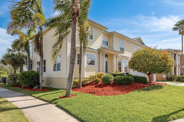 view of front of home featuring a front lawn