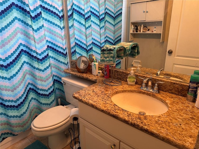 bathroom with vanity, tile patterned flooring, toilet, and a shower with curtain