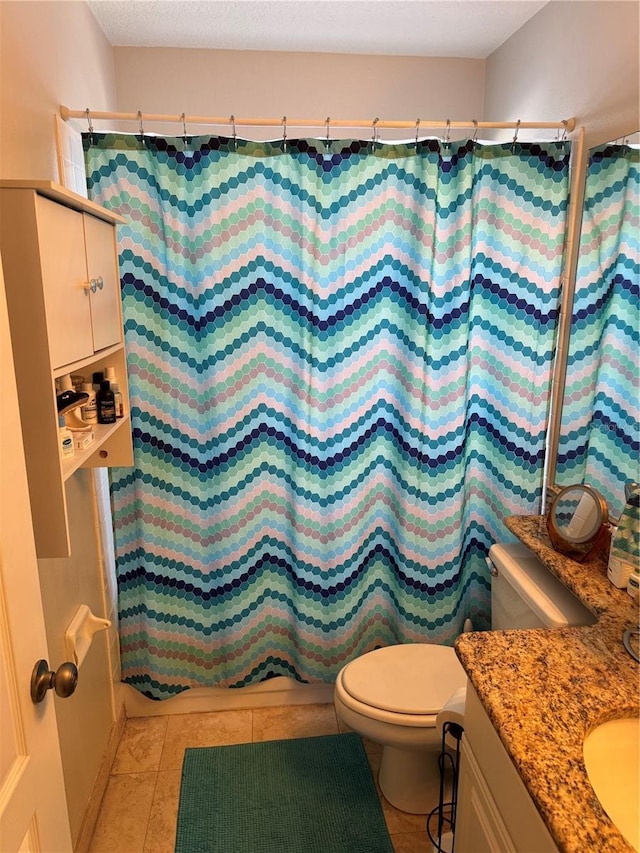 full bath with vanity, tile patterned floors, toilet, and a shower with curtain