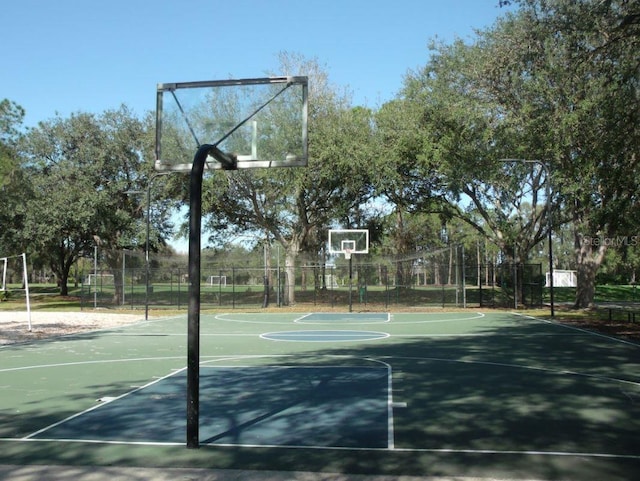 view of sport court with fence and community basketball court