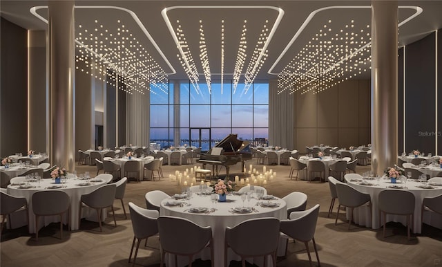 dining room with expansive windows and a high ceiling