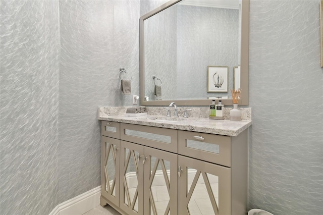 2604 S Bryant Cir, Tampa, FL 33629 - bathroom with a textured wall, vanity, and tile patterned flooring
