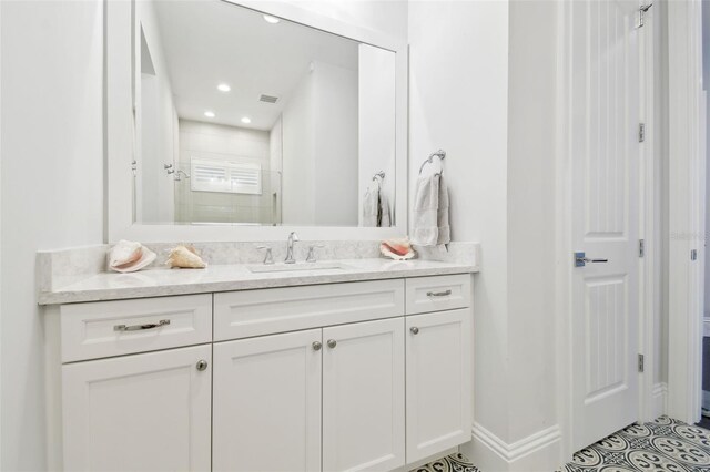 2604 S Bryant Cir, Tampa, FL 33629 - full bathroom featuring a shower stall, vanity, and recessed lighting