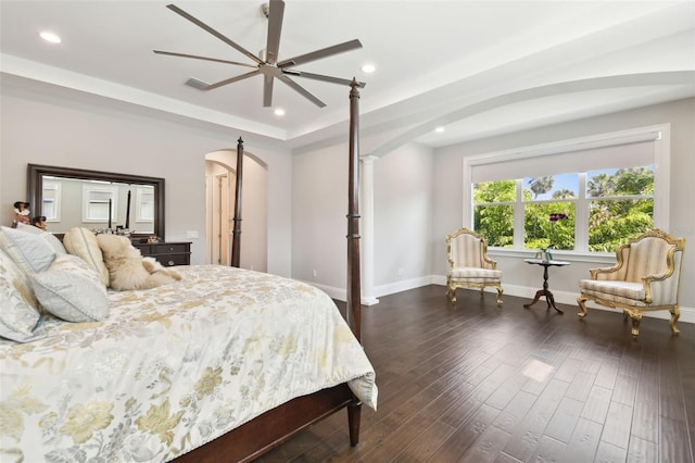 2604 S Bryant Cir, Tampa, FL 33629 - bedroom featuring arched walkways, recessed lighting, dark wood-style flooring, baseboards, and ceiling fan