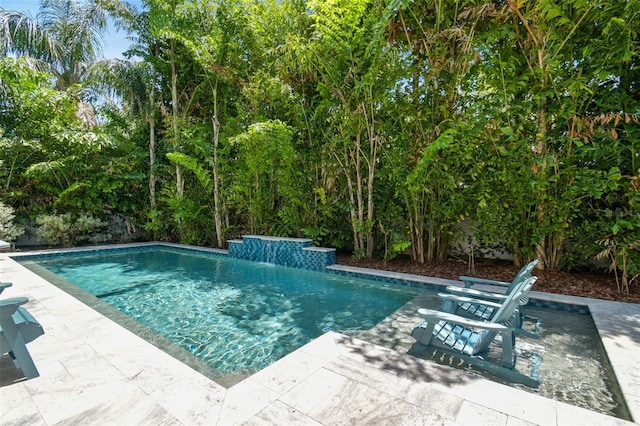 2604 S Bryant Cir, Tampa, FL 33629 - outdoor pool with a patio area