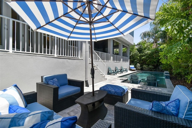 2604 S Bryant Cir, Tampa, FL 33629 - view of patio with outdoor lounge area, stairway, and an outdoor pool