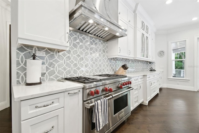 2604 S Bryant Cir, Tampa, FL 33629 - kitchen featuring double oven range, exhaust hood, white cabinetry, glass insert cabinets, and light stone counters