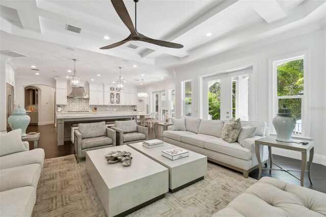2604 S Bryant Cir, Tampa, FL 33629 - living area with recessed lighting, a chandelier, ceiling fan, light wood-type flooring, and coffered ceiling