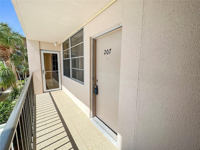 doorway to property with a balcony