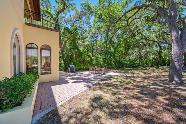 1966 Freedom Dr, Clearwater, FL 33755 - view of yard with a patio and a balcony