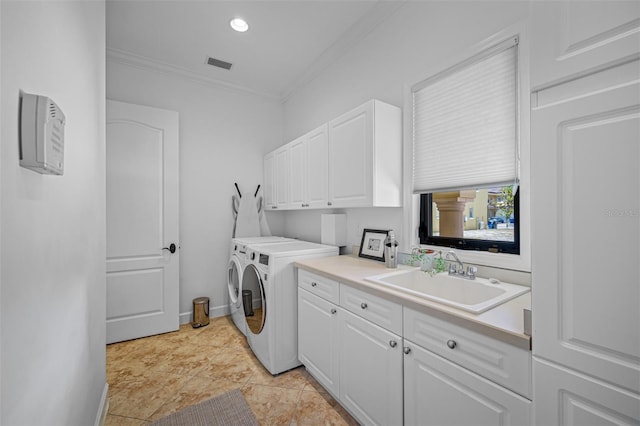 1966 Freedom Dr, Clearwater, FL 33755 - laundry room featuring washer and dryer, ornamental molding, cabinet space, baseboards, and recessed lighting