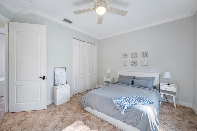 1966 Freedom Dr, Clearwater, FL 33755 - bedroom with a closet, crown molding, baseboards, and a ceiling fan