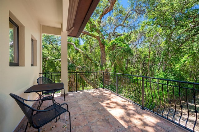 1966 Freedom Dr, Clearwater, FL 33755 - view of patio / terrace with a balcony