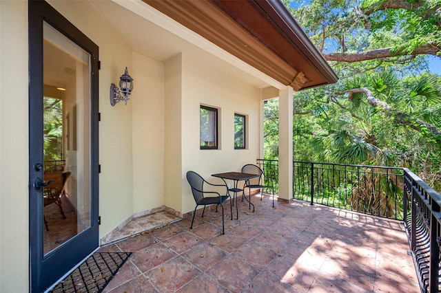1966 Freedom Dr, Clearwater, FL 33755 - view of patio featuring a balcony