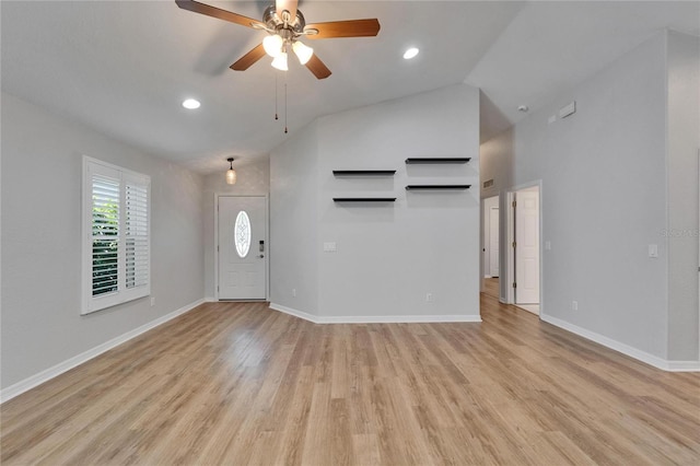 11932 Whisper Creek Dr, Riverview, FL 33569 - entryway featuring light wood-style flooring, lofted ceiling, a ceiling fan, baseboards, and recessed lighting