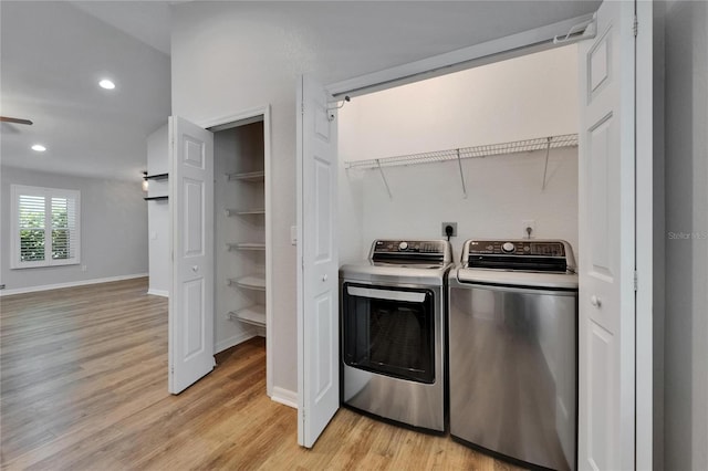 11932 Whisper Creek Dr, Riverview, FL 33569 - laundry room featuring washing machine and clothes dryer, light wood finished floors, recessed lighting, and baseboards