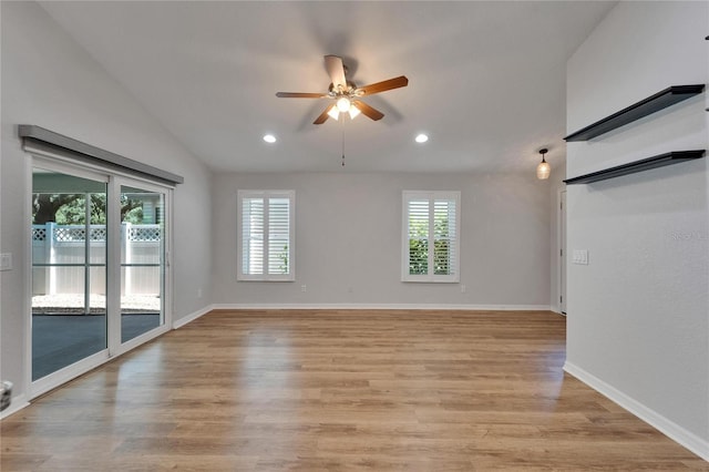 11932 Whisper Creek Dr, Riverview, FL 33569 - spare room with ceiling fan, recessed lighting, light wood-style floors, baseboards, and vaulted ceiling