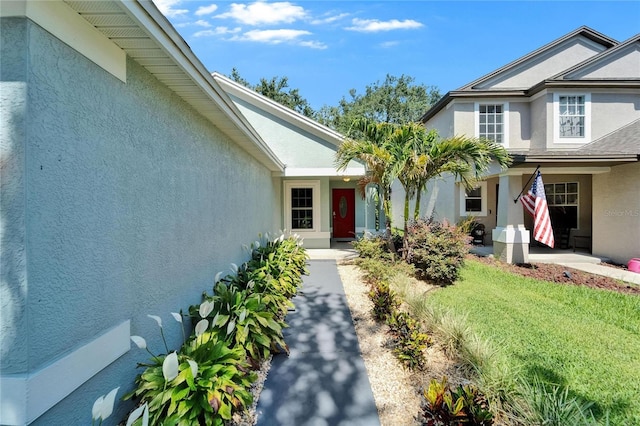 11932 Whisper Creek Dr, Riverview, FL 33569 - property entrance with stucco siding