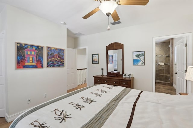 bedroom with visible vents, a ceiling fan, and connected bathroom