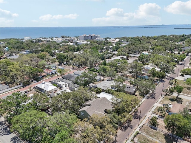 bird's eye view featuring a residential view and a water view