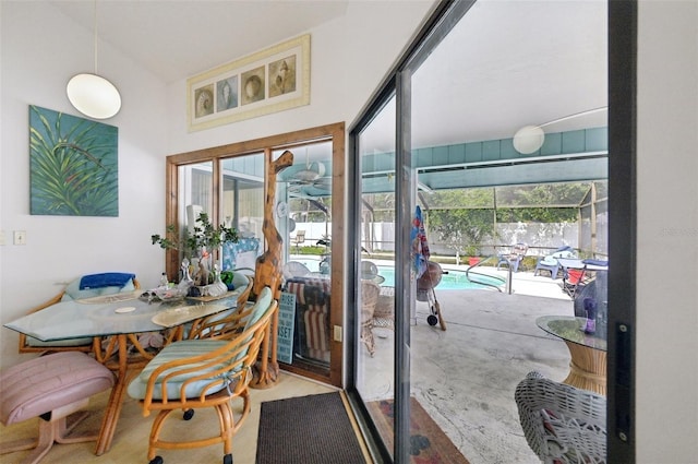 3093 Woodpine Cir, Sarasota, FL 34231 - doorway to outside with a sunroom