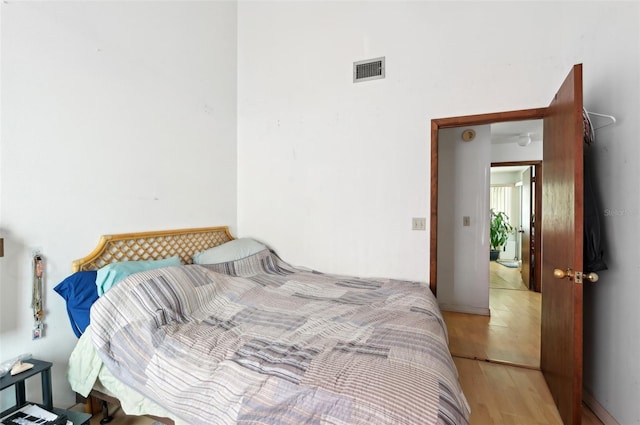 3093 Woodpine Cir, Sarasota, FL 34231 - bedroom featuring visible vents and light wood finished floors