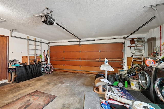 3093 Woodpine Cir, Sarasota, FL 34231 - garage with washing machine and clothes dryer, a garage door opener, and electric panel