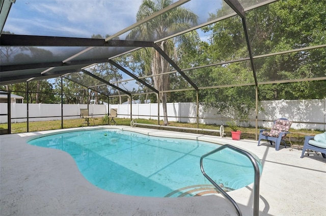 3093 Woodpine Cir, Sarasota, FL 34231 - view of swimming pool featuring a fenced backyard, a fenced in pool, glass enclosure, and a patio