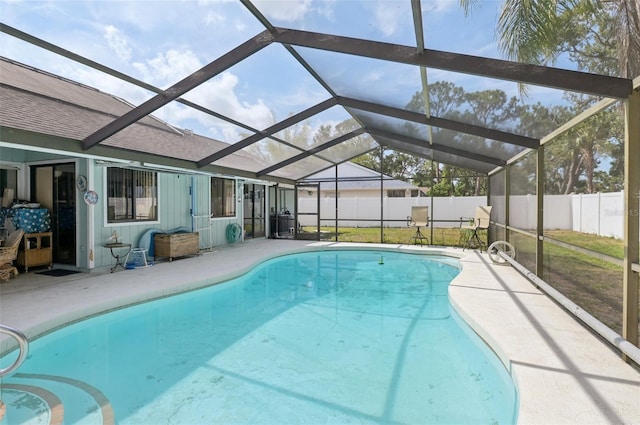 3093 Woodpine Cir, Sarasota, FL 34231 - view of swimming pool featuring a fenced in pool, a fenced backyard, glass enclosure, and a patio area