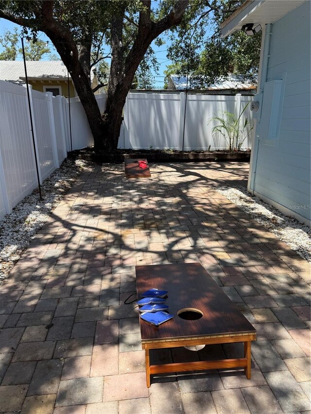 110 Kenwood Ave, Clearwater, FL 33755 - fenced backyard featuring a patio
