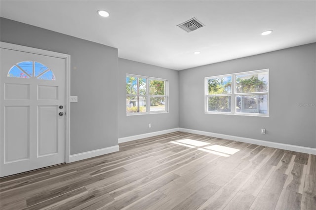 660 Palm Ave, Tarpon Springs, FL 34689 - entryway featuring visible vents, recessed lighting, light wood-style flooring, and baseboards