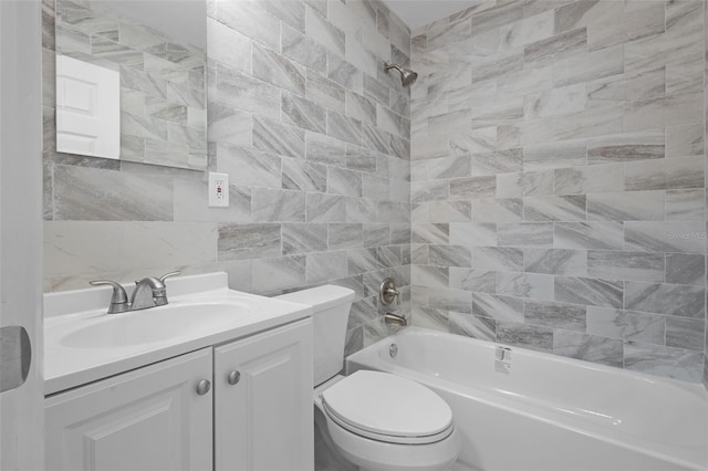 660 Palm Ave, Tarpon Springs, FL 34689 - full bath with vanity, toilet, shower / bathtub combination, and tile walls