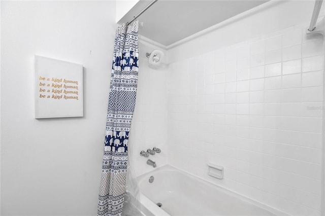 bathroom featuring shower / bath combination with curtain