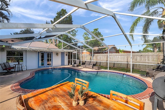view of pool featuring a fenced in pool, a patio area, french doors, and a fenced backyard
